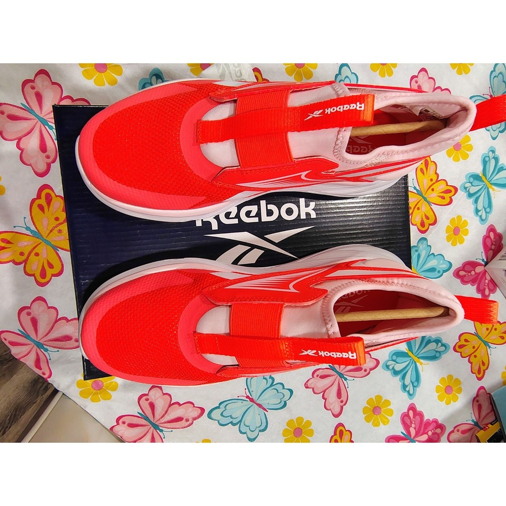 bright pink Reebok women's shoe